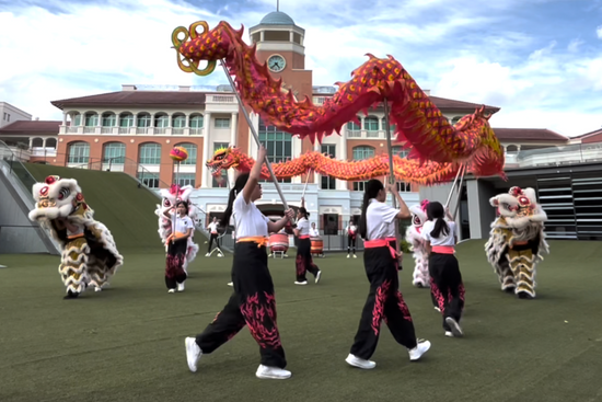 Exclusive Dragon and Lion Dance performance by Nanyang Girls' High.