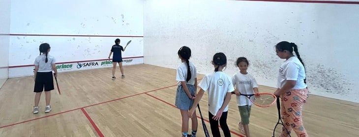 Girls team practising their skills and building resilience through the drills with Tan Min Zi.