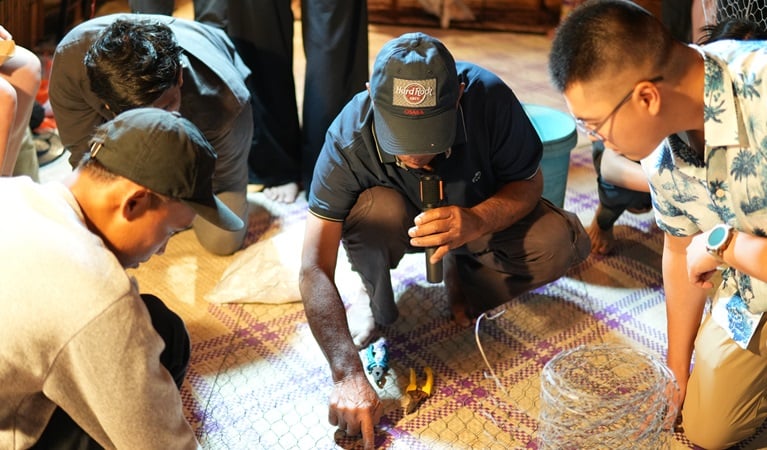 Mr Hamzah demo crafting a traditional Bubu fish trap