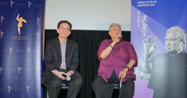 Kenneth Tan (left), president of Singapore Film Society hosted the post screening Q&A of The Bodyguard with Sammo Hung (right)