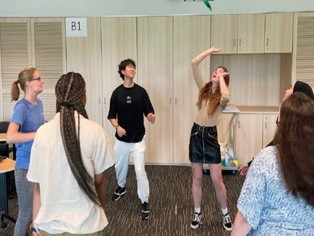 University of Nebraska-Lincoln students engaged in a game of Chapteh, fostering global connections and friendships.