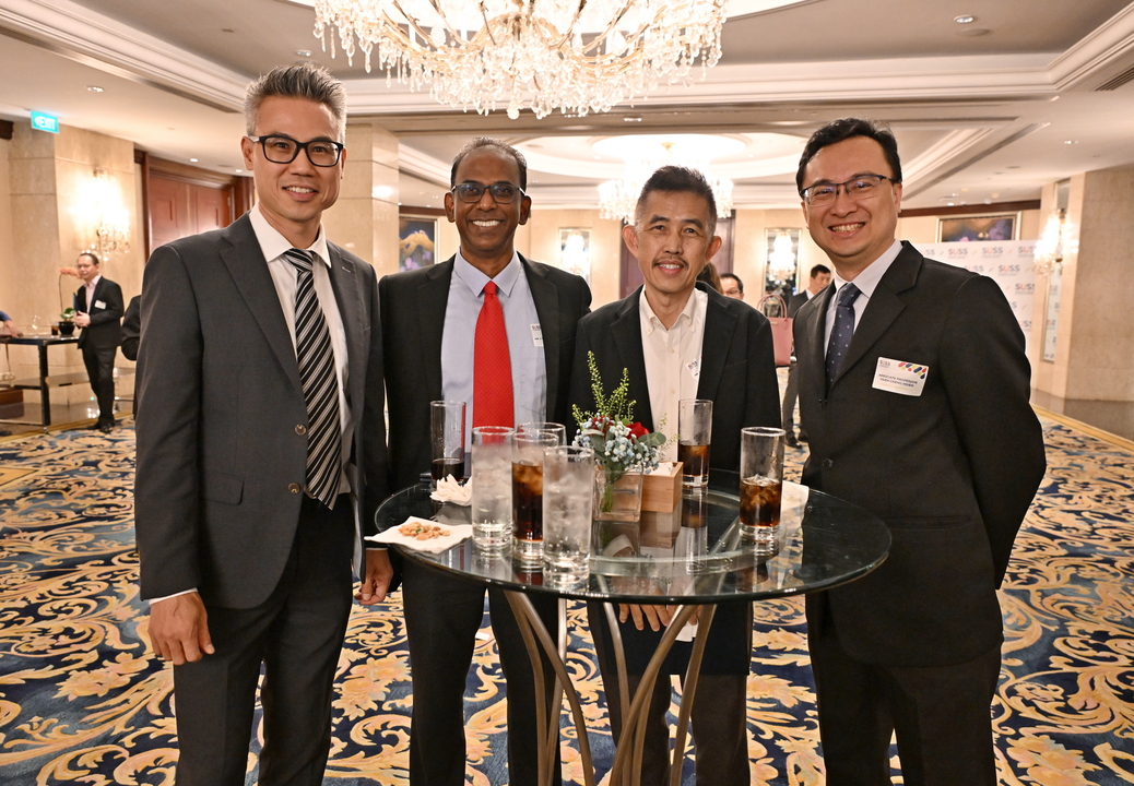 A group of enthusiastic faculty members enjoying the cocktail reception at the SUSS Faculty Appreciation Event 2024 held at the Shangri-La Hotel.