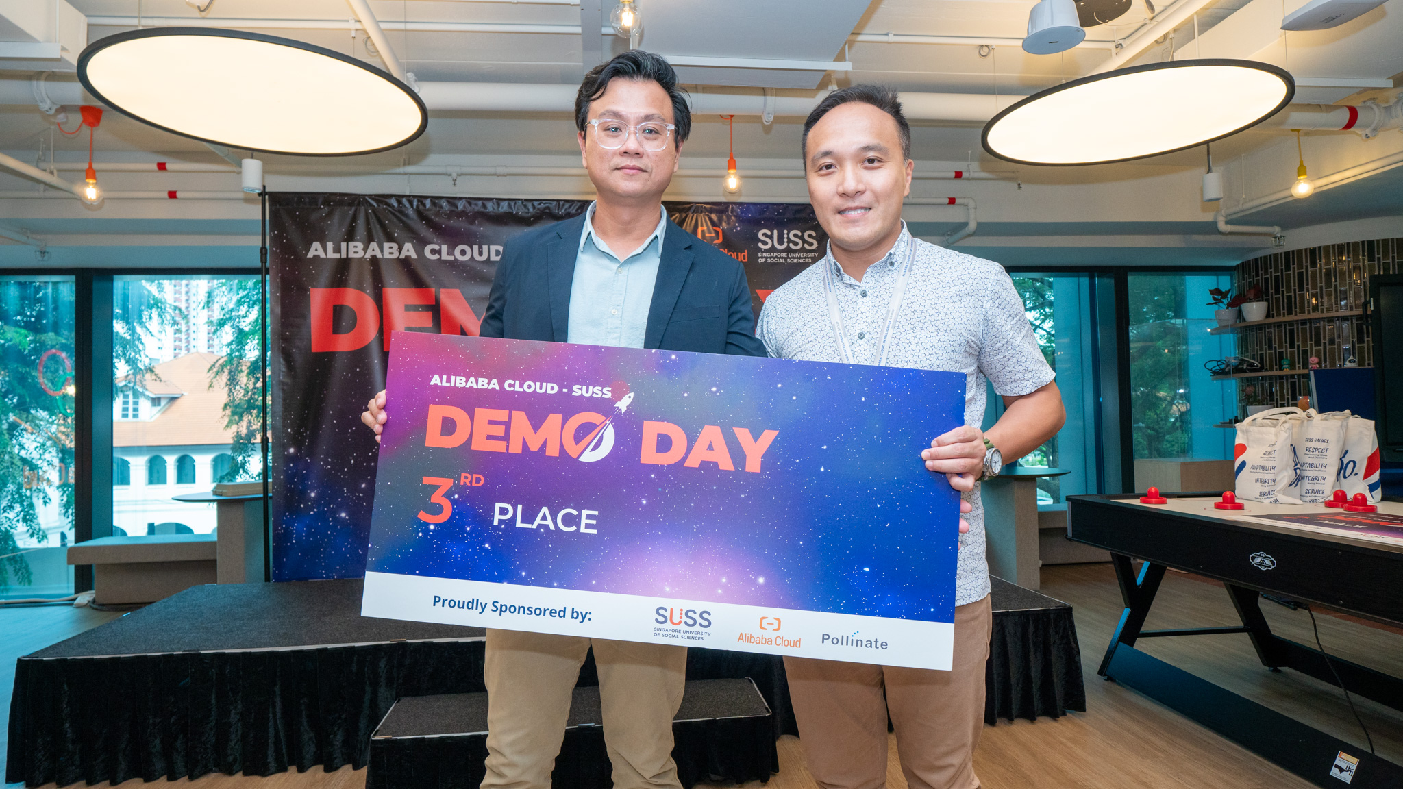Second runner-up of Alibaba Cloud-SUSS Demo Day, World Coaches Academy, with Chris Tan, Director of Sales and Business Development at Alibaba Cloud.