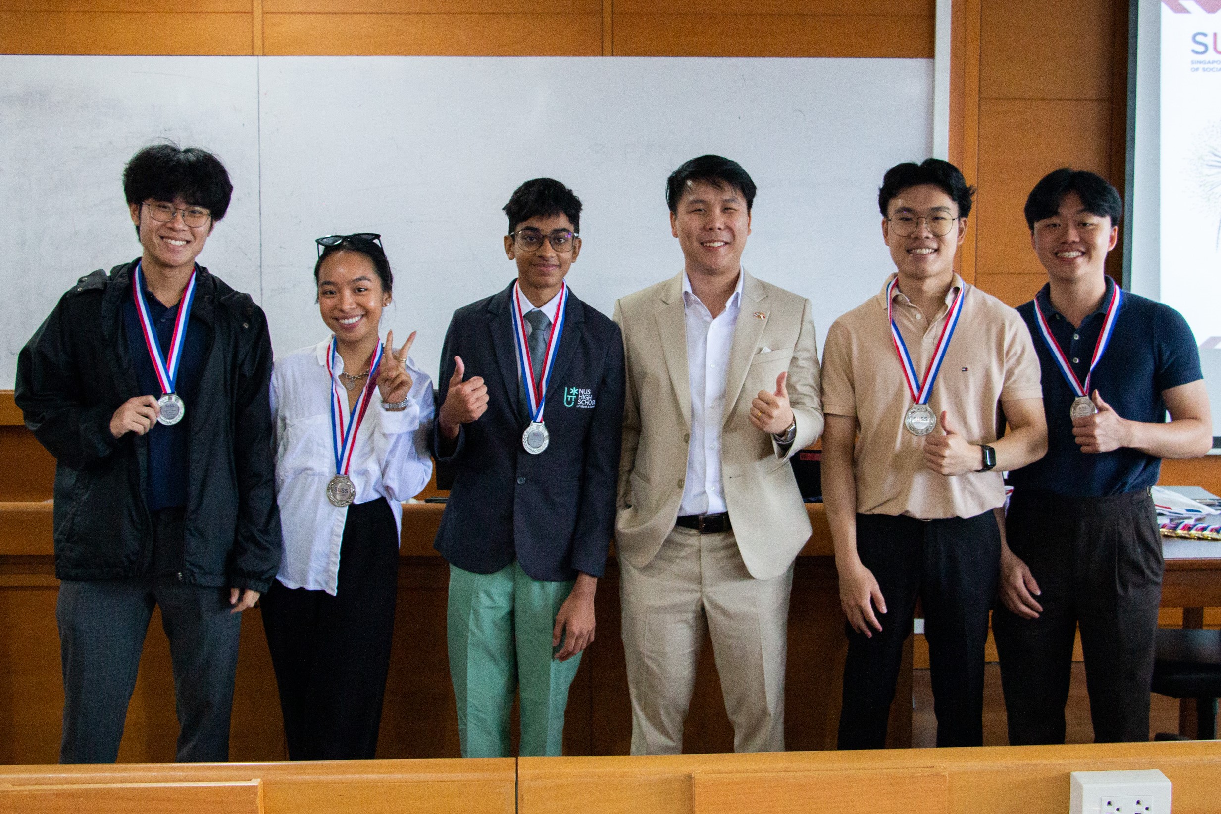 SUSS, NUHS and Siam University students, alongside Gordon Ho, Country Head of Thailand, Ngee Ann Polytechnic.