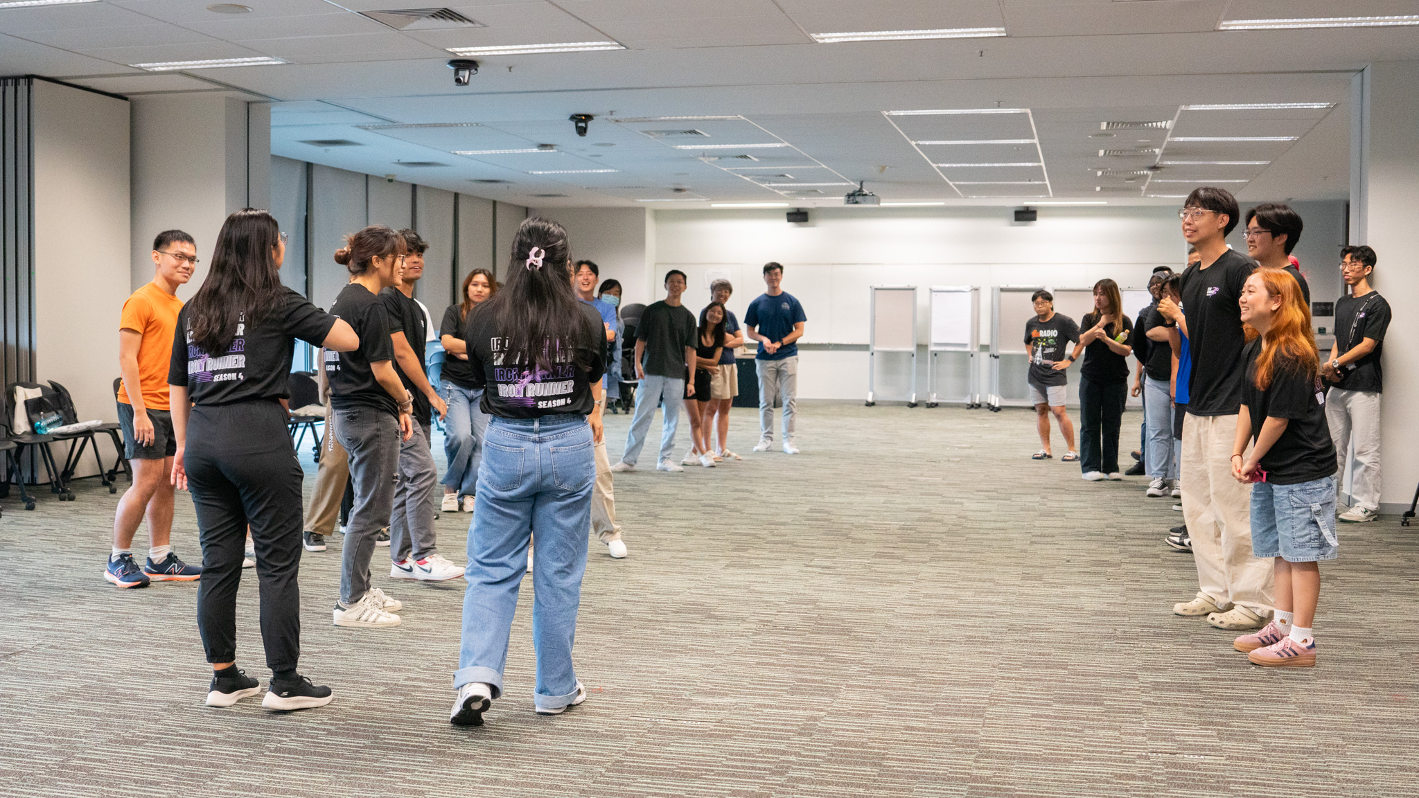 Strings and shapes – participants create shapes within their group while blindfolded as a team-building game during the Closing Ceremony