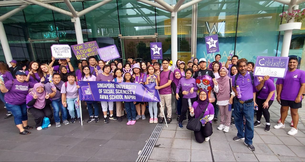 A group photo at the end of The Purple Parade march